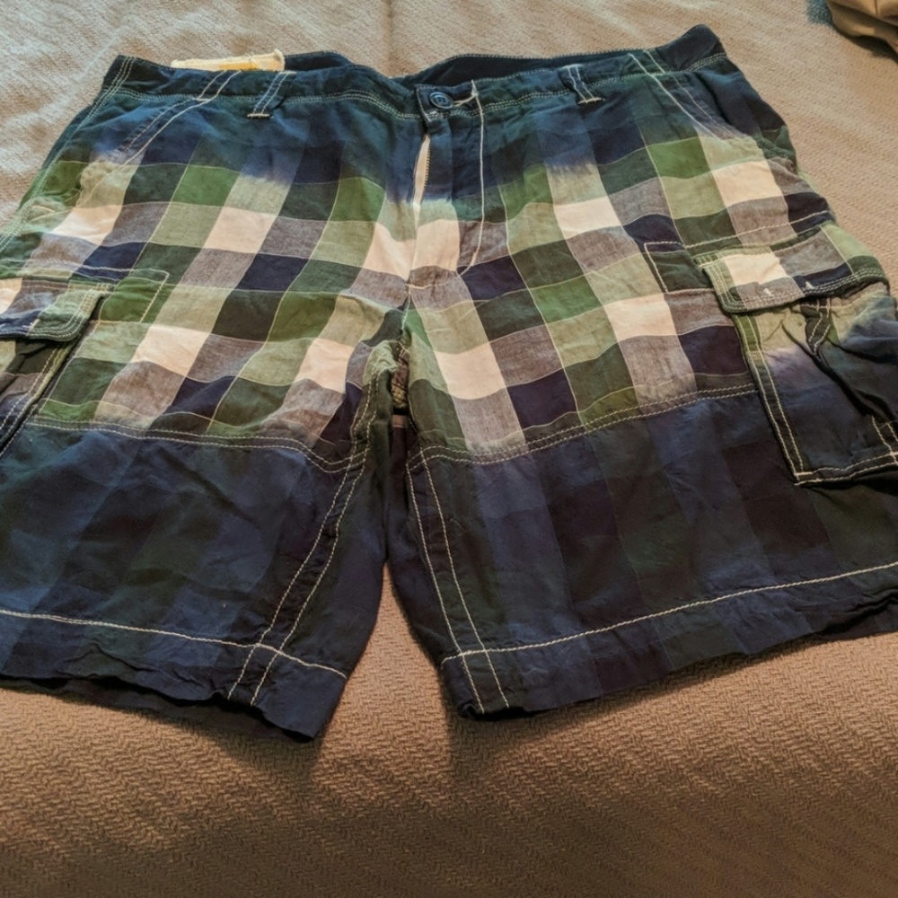 Blue, green, and white cargo shorts